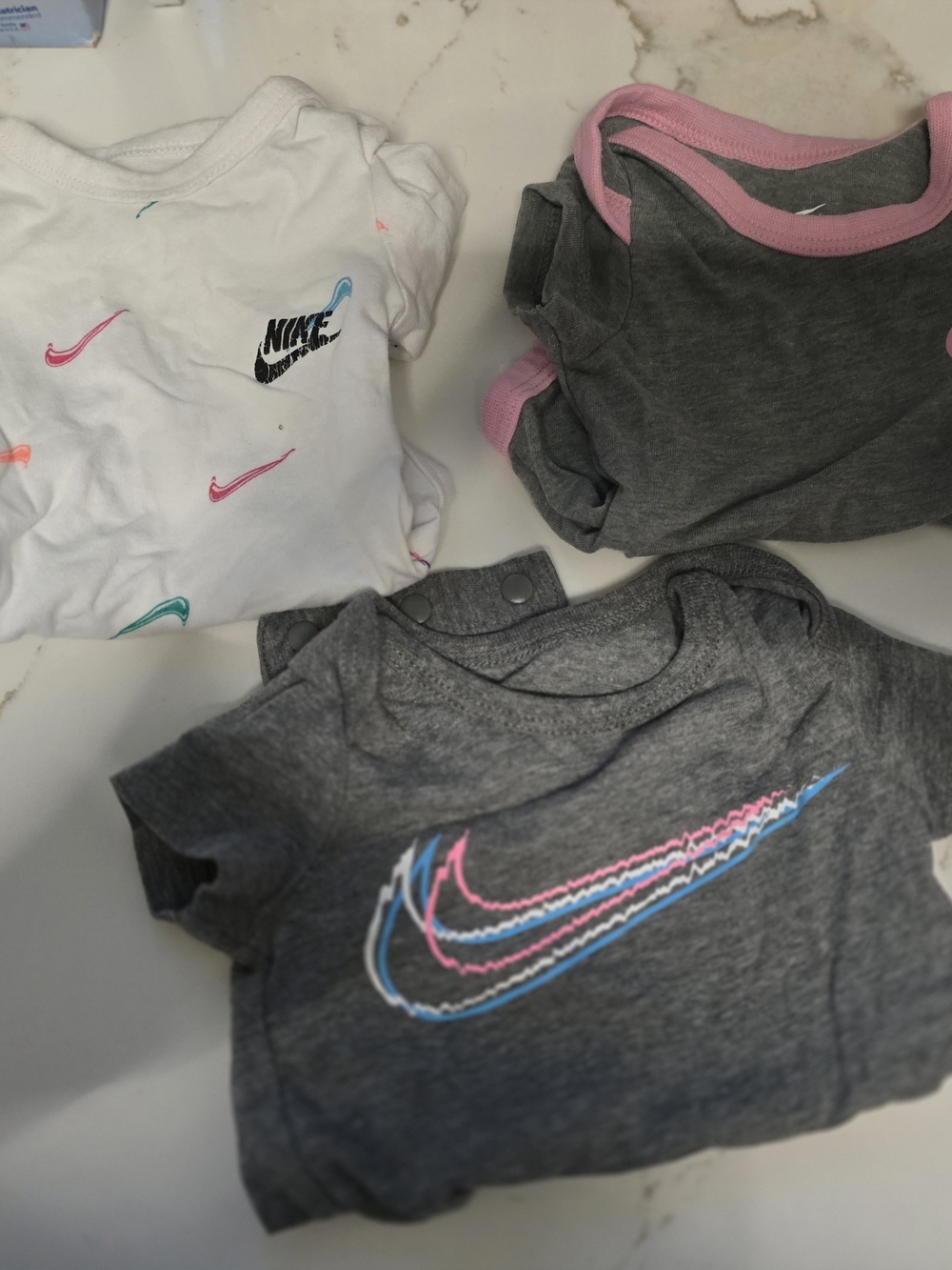 Nike Gray and White Baby Onesie Set with Pink and Teal Accents